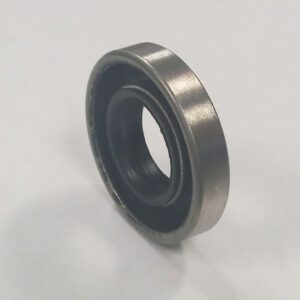 A small metal ball bearing with a black rubber seal.