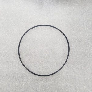 A simple black circular ring on a light surface.